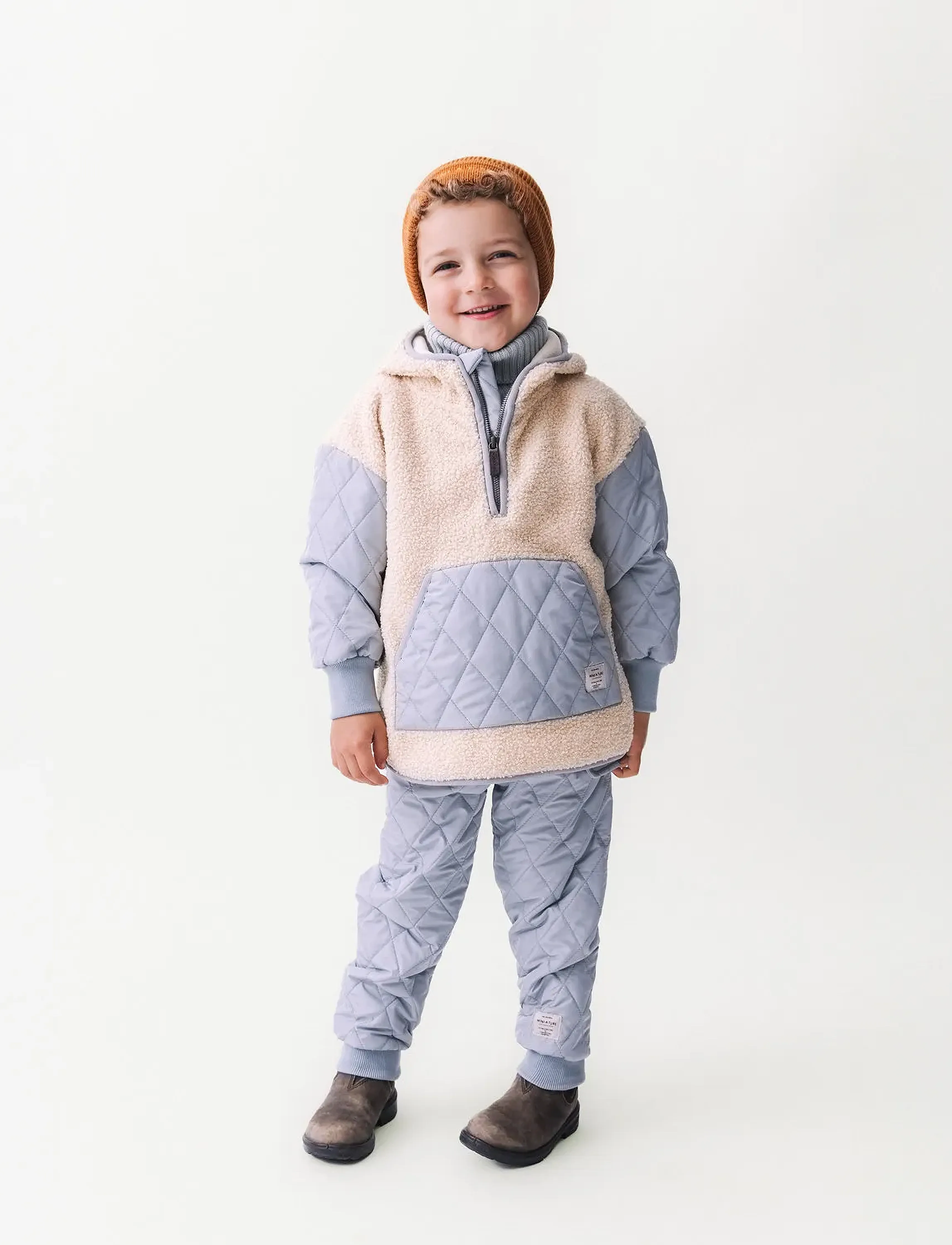 A child's hooded thermo anorak winter jacket for cold weather