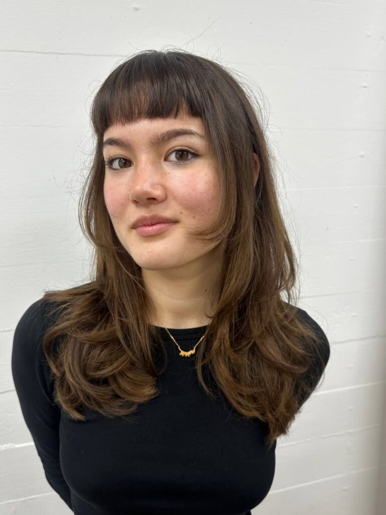Long layered hair with short micro fringe