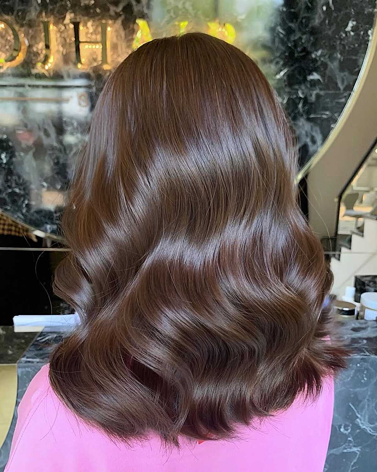 Wavy hair in milk chocolate brown with salon shine