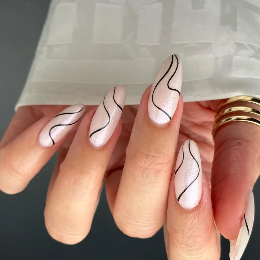 Minimalist white nails with delicate line art