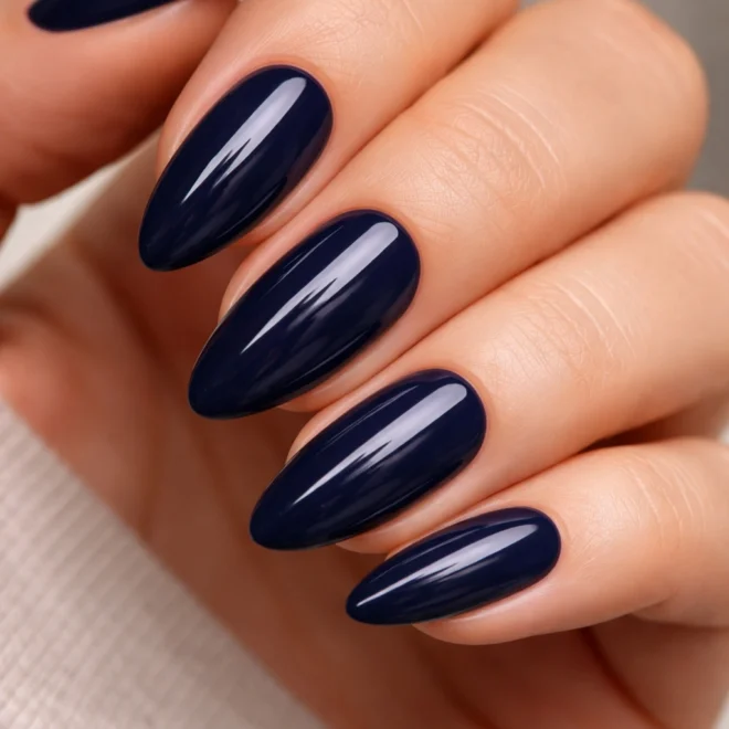 Glossy midnight navy blue almond nails