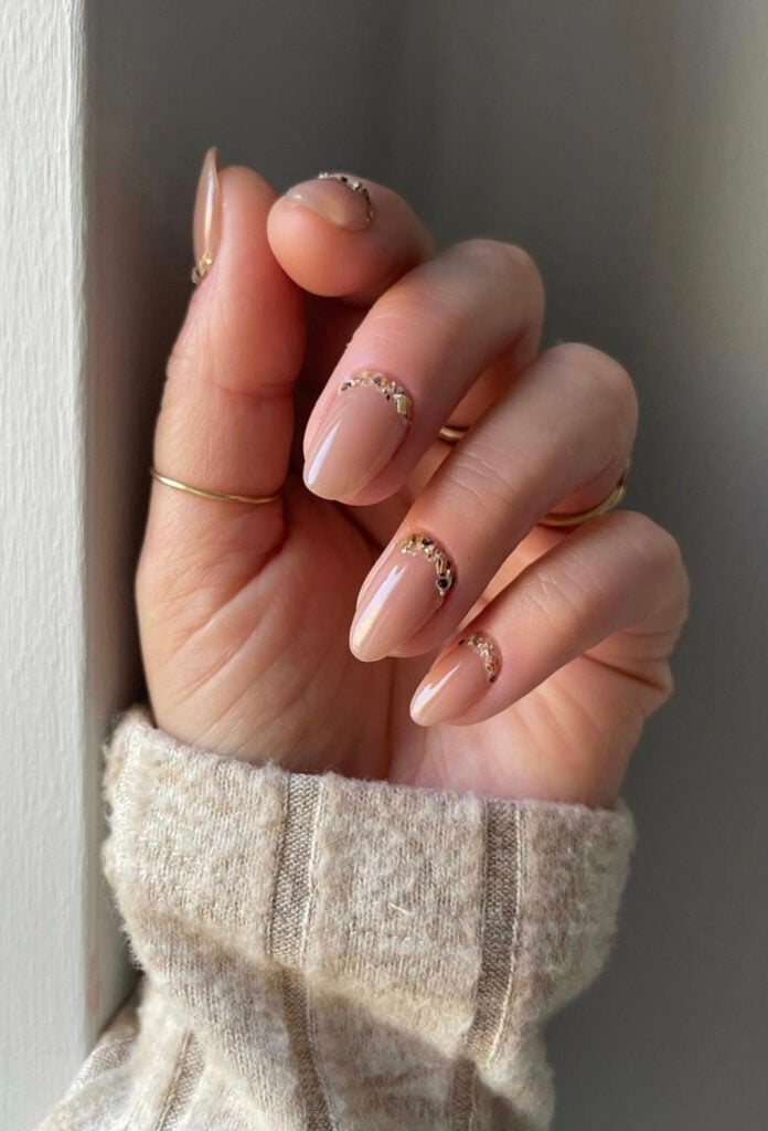 Nude almond nails with gold crystal cuticle accents, long
