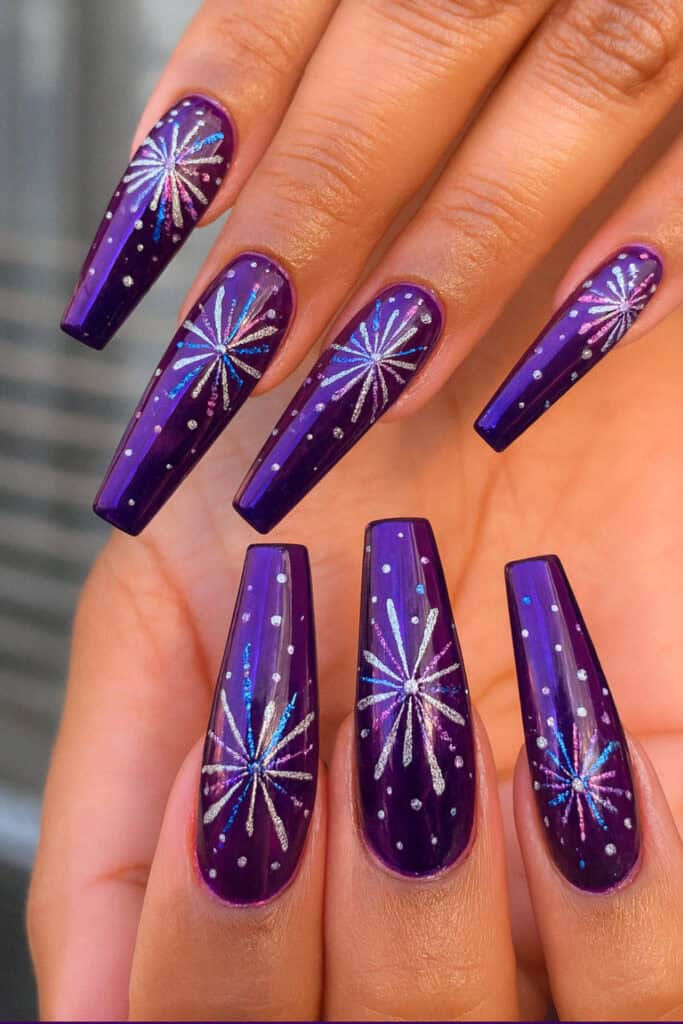 Black nails with glitter fireworks nail art
