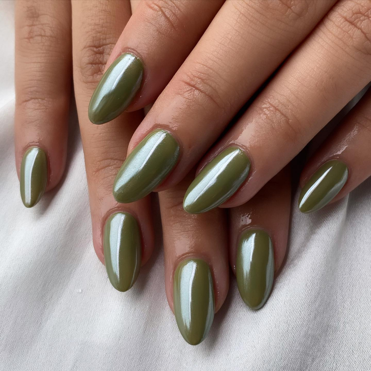 Metallic olive green chrome nails