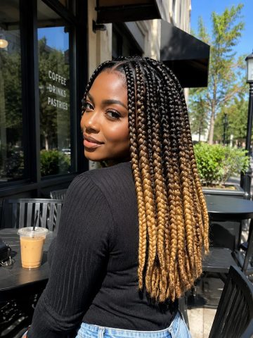 Black-to-honey ombre box braids with golden tips