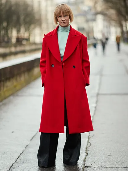 Woman in a red coat, Paris street style