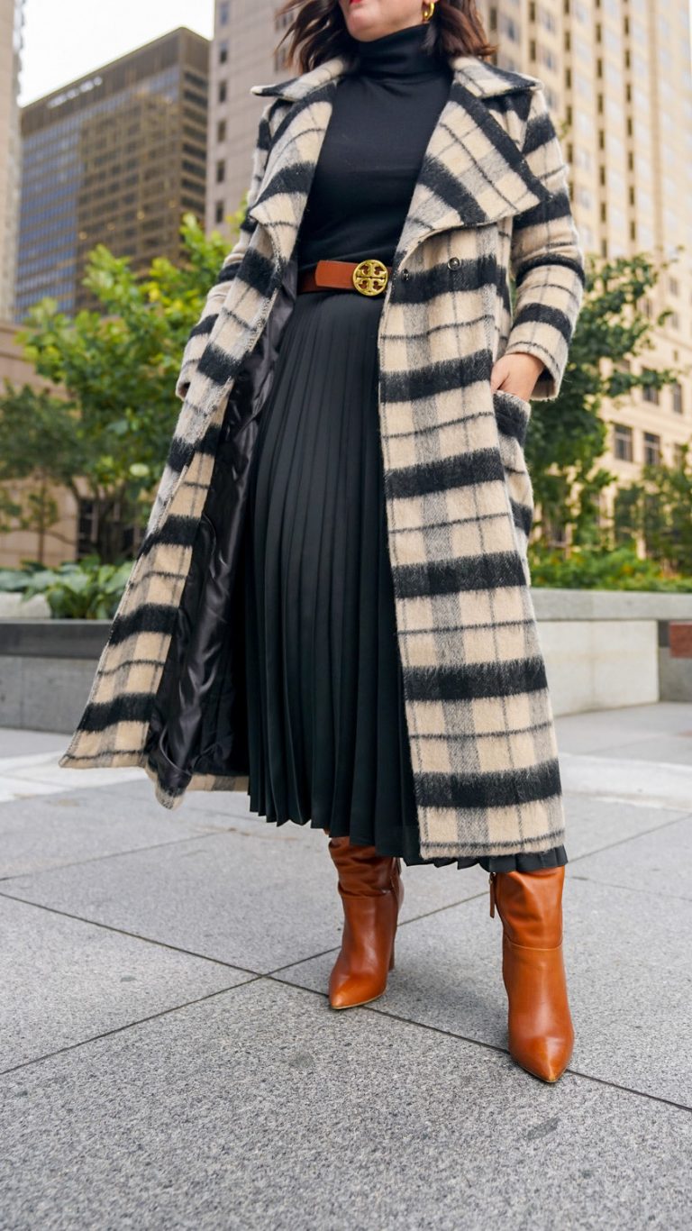 Woman in a grey plaid car coat