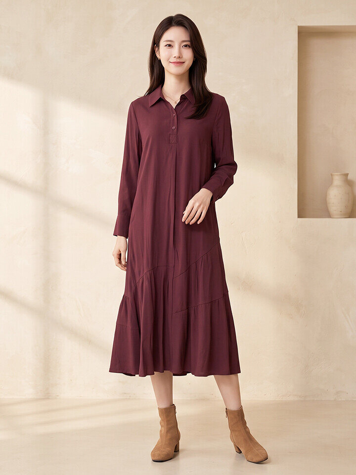 Woman in a burgundy shirt dress and tan suede block-heel ankle boots