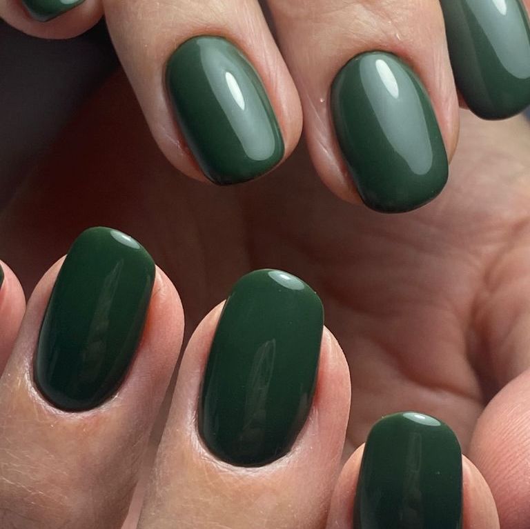 Short square nails in glossy deep forest green