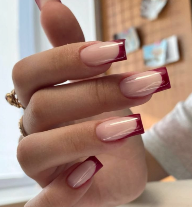 Short square cream nails with cranberry red French tips