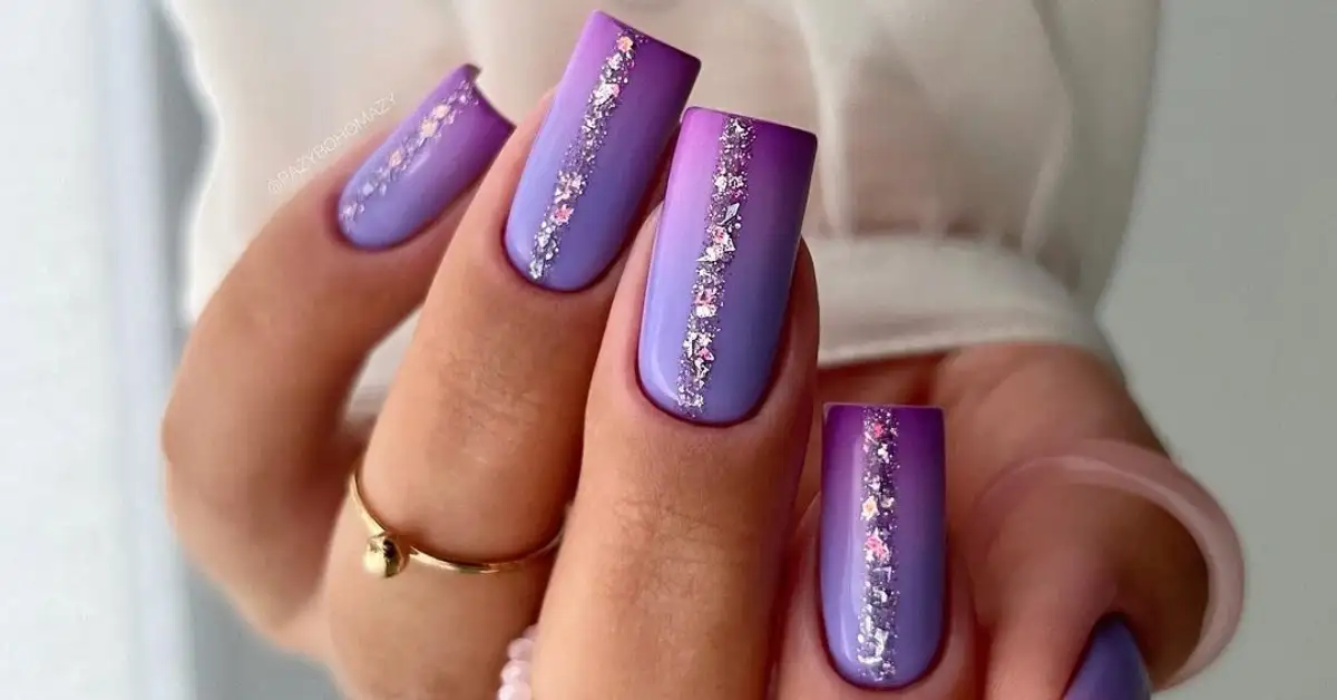 Purple ombre nails with glitter stripe