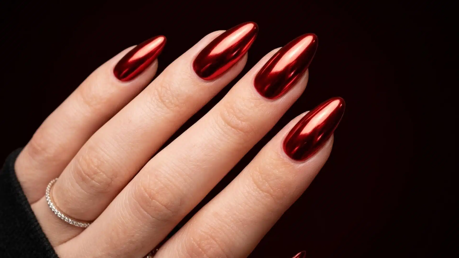 Almond nails in scarlet red mirror chrome