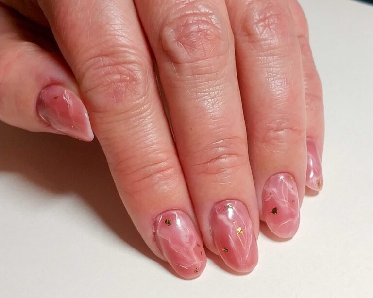 Almond nails with pink rose quartz marble effect, white veining and tiny gold flecks