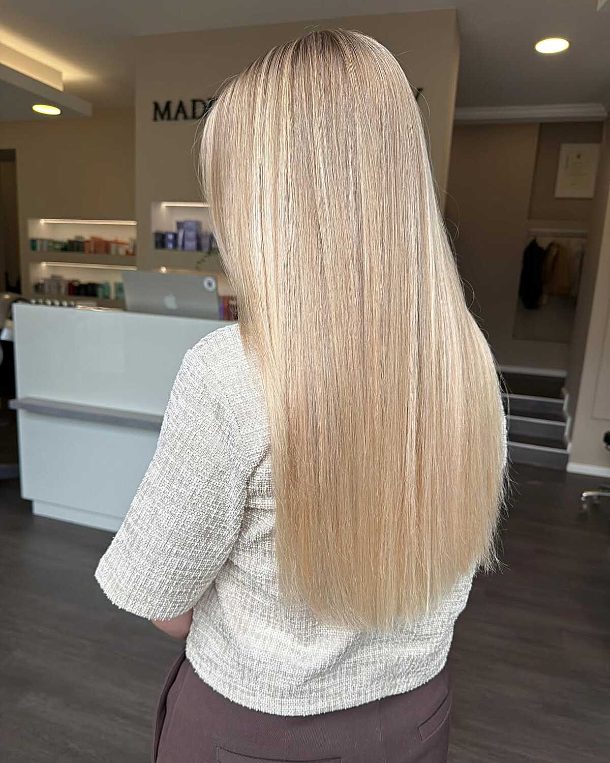 Pin-straight long hair in seamless vanilla butter blonde