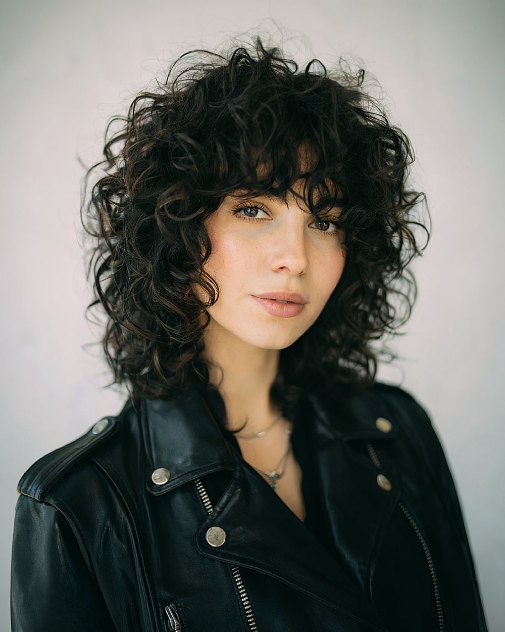 Curly shag haircut with curly bangs
