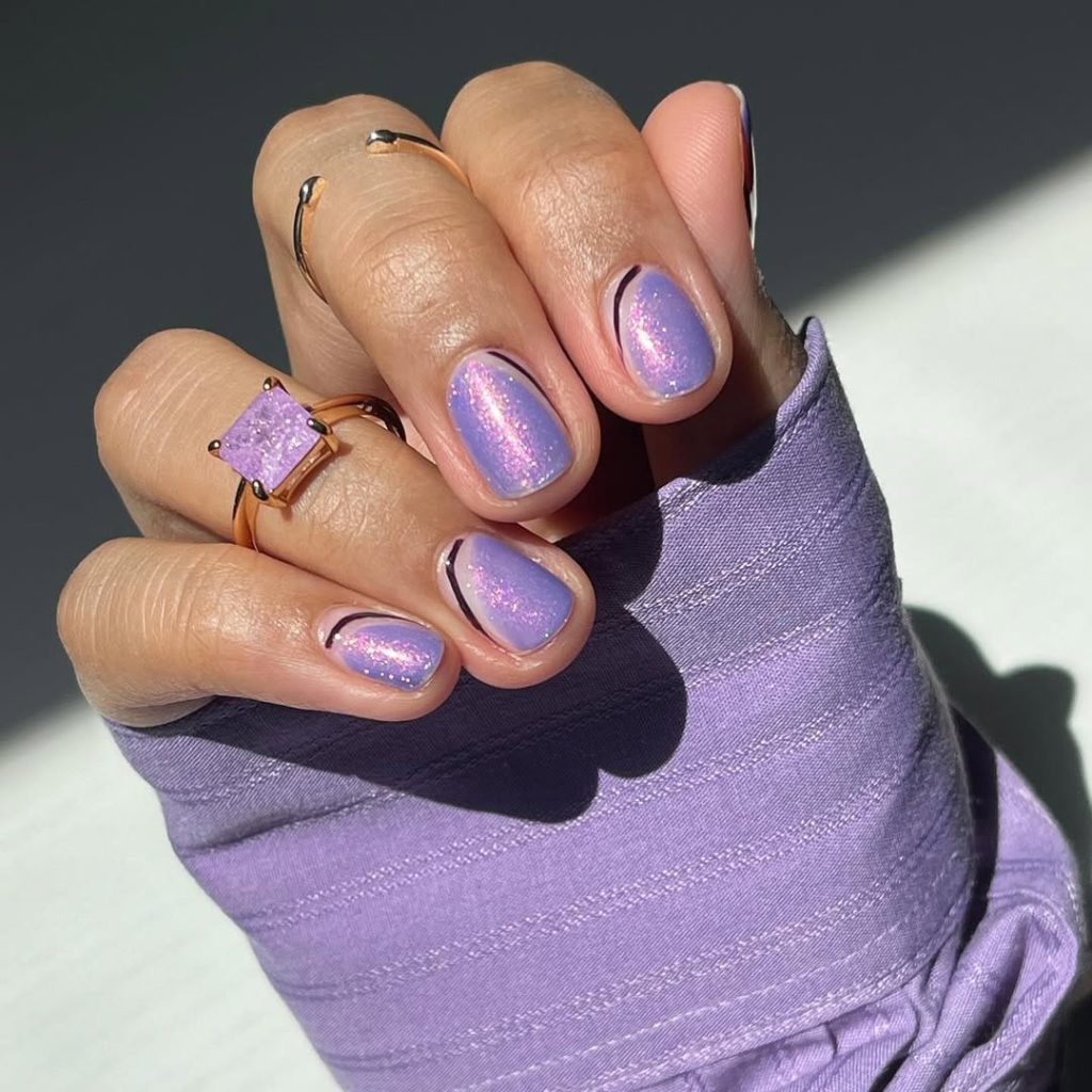 Frosted Lilac with Silver Sparkle: pale lilac nails with fine silver shimmer