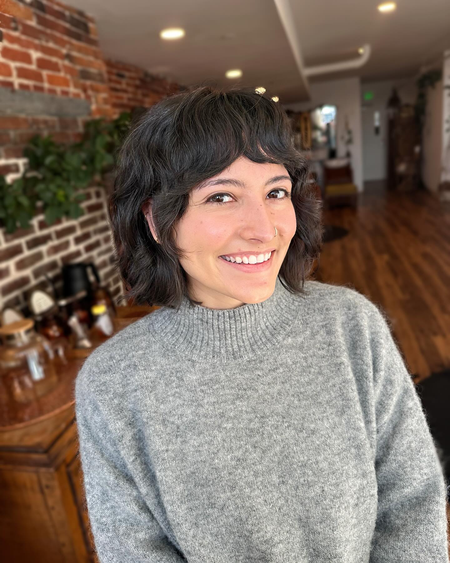 Short Italian shag bob with micro curtain fringe and soft nape graduation