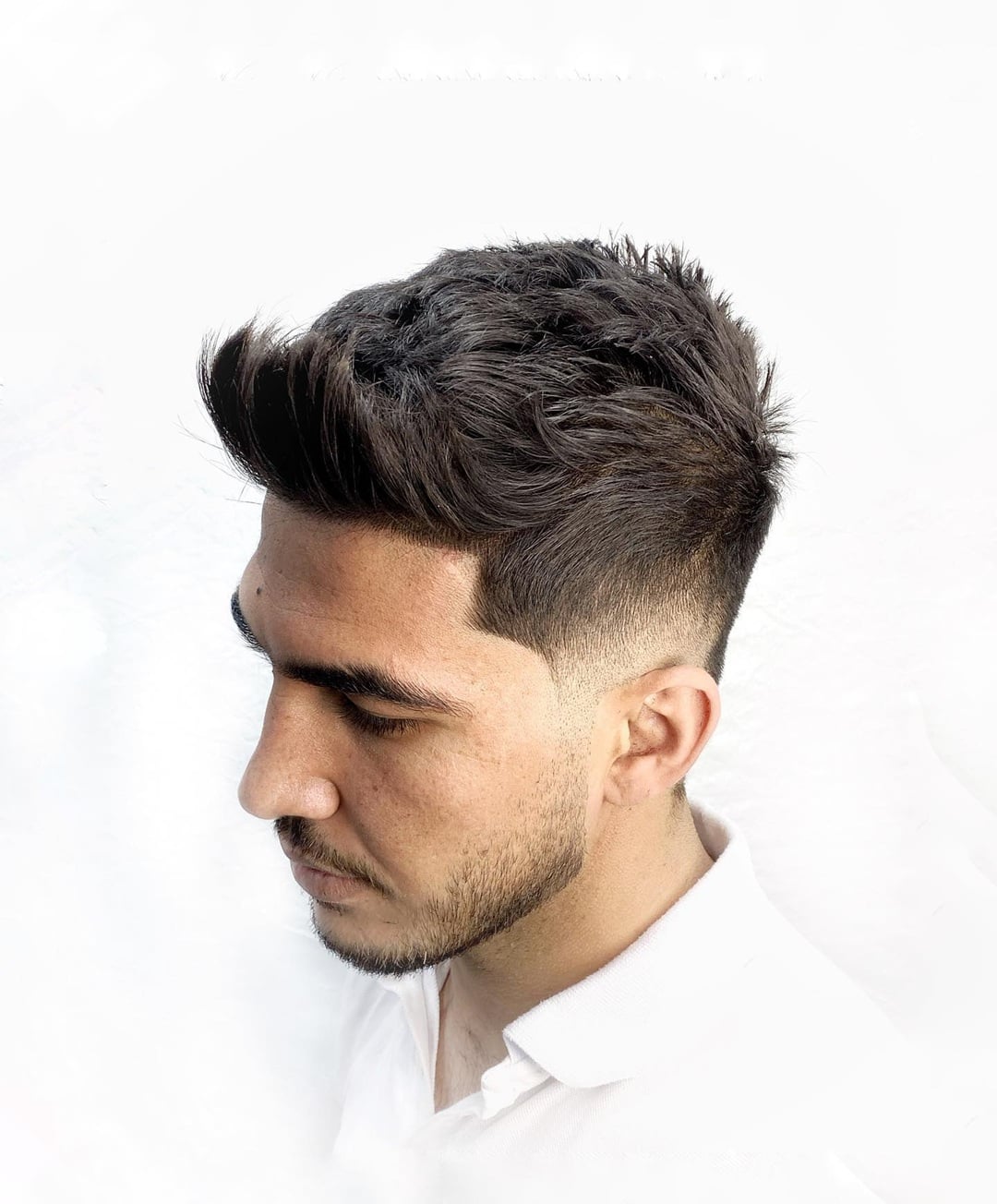 Man with a short spiky textured haircut