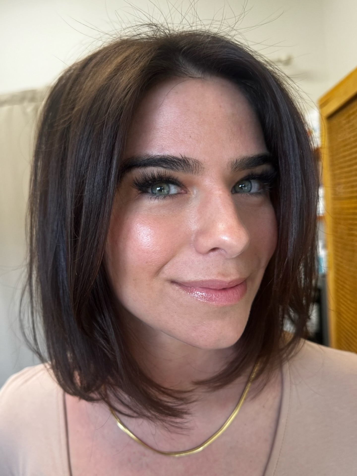 Espresso brunette Italian bob with smooth face-framing layers