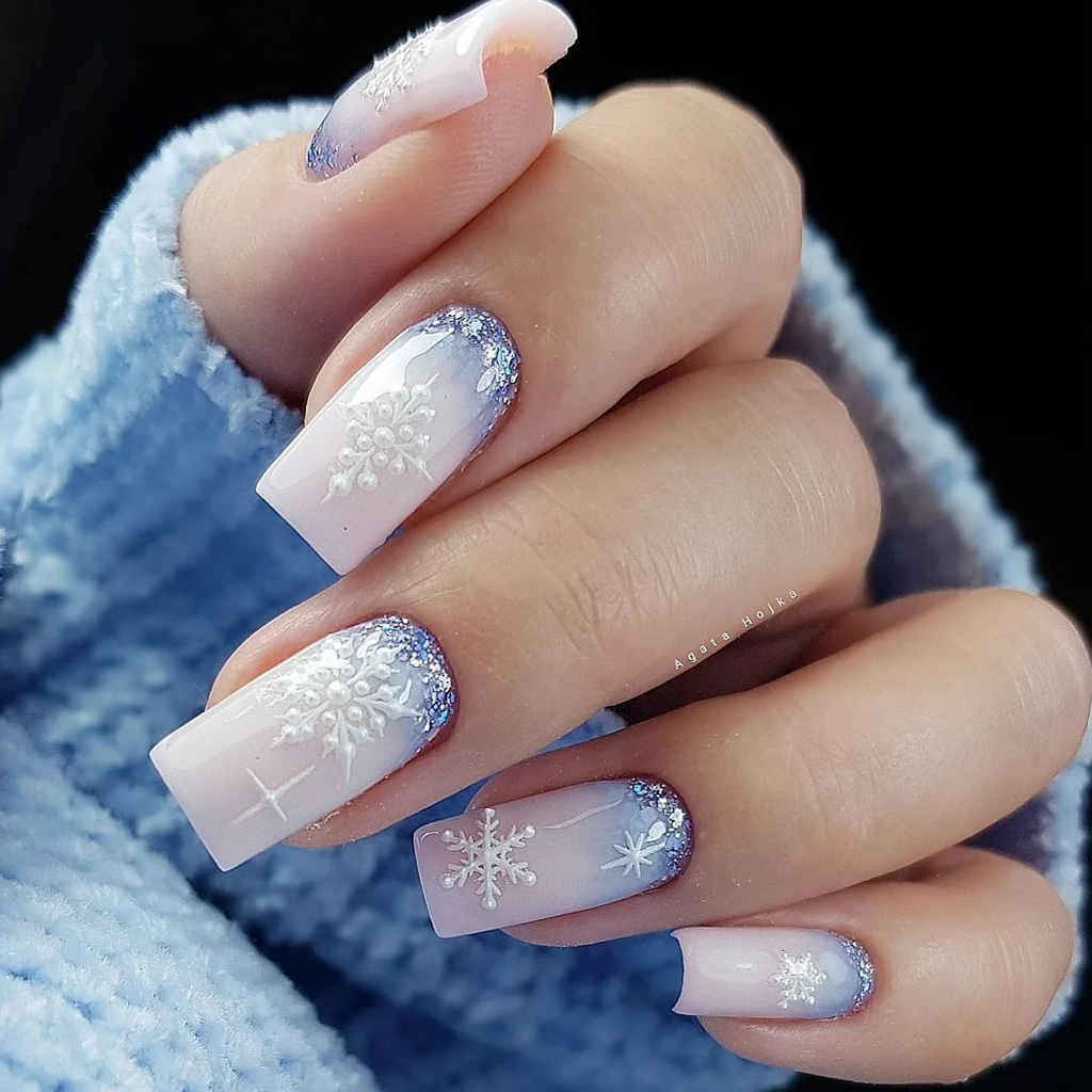 Icy blue and white glitter ombre nails with snowflakes