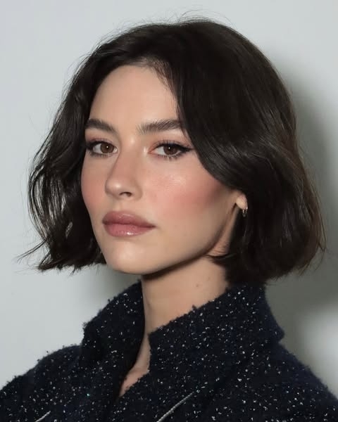 Chin-length Italian bob with soft center part and subtle nape lift
