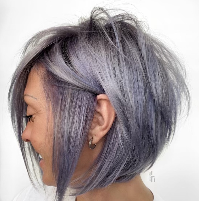 Lavender-tinted silver stacked bob haircut