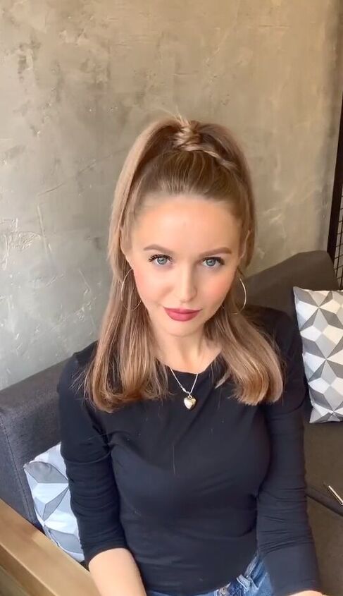 Half-up ponytail with a side braid wrapped around its base
