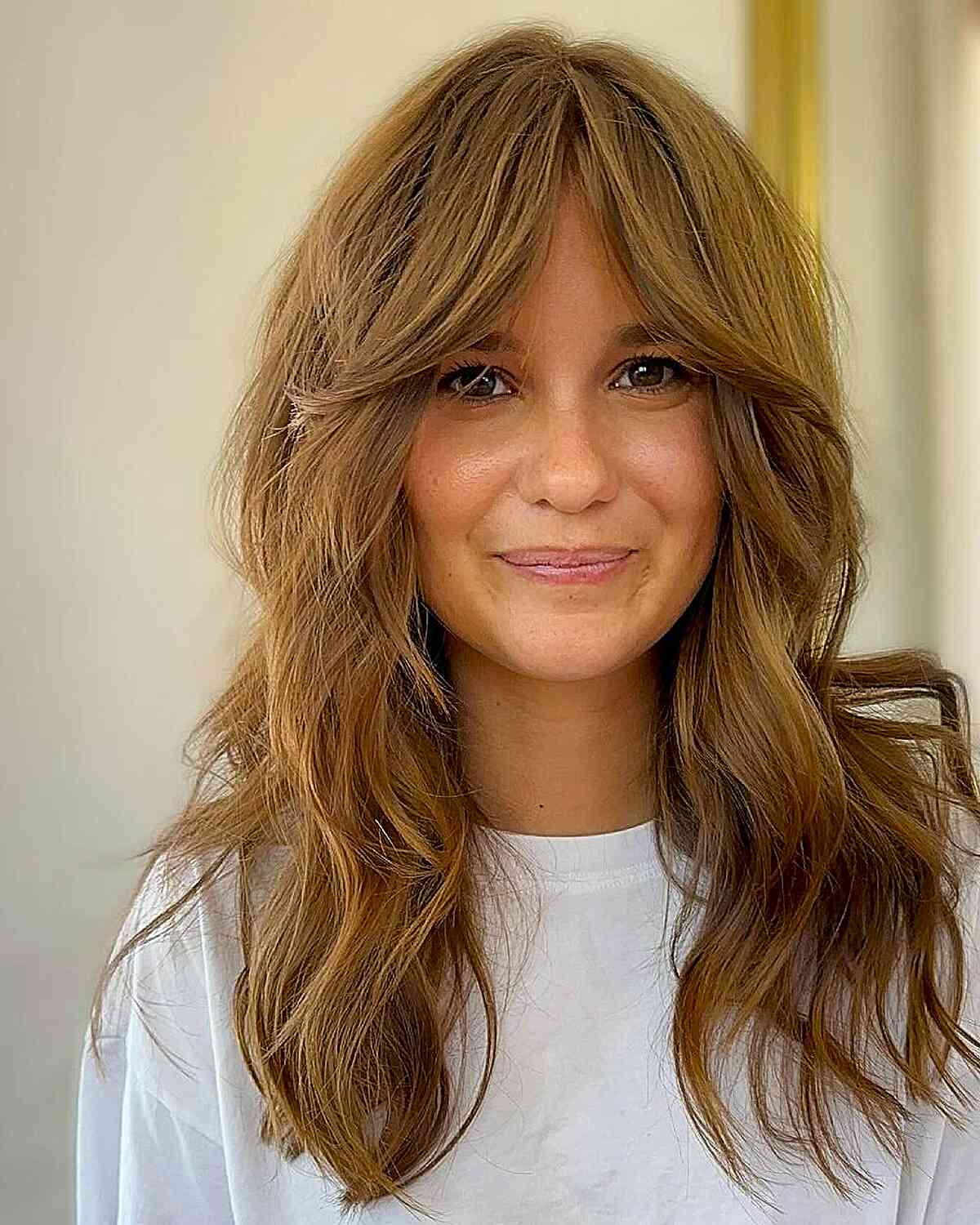 Soft long shag with curtain bangs and textured layers