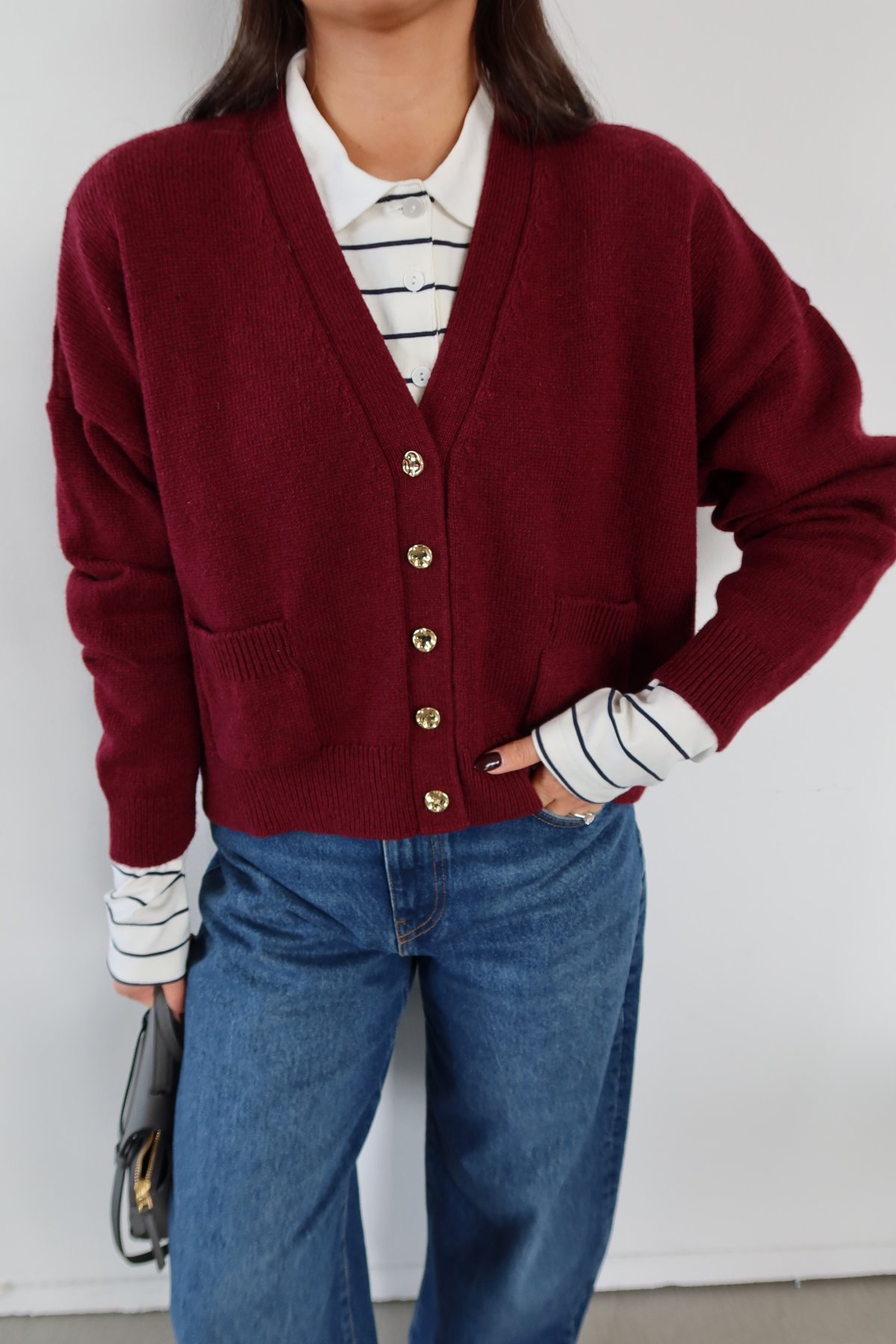 Burgundy cardigan with gold buttons and front pockets