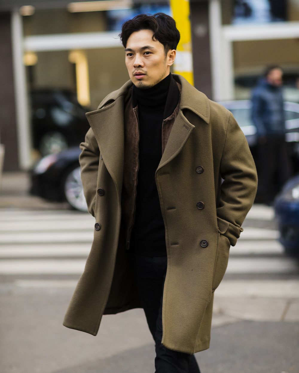 Man wearing a statement winter coat with city-ready layers