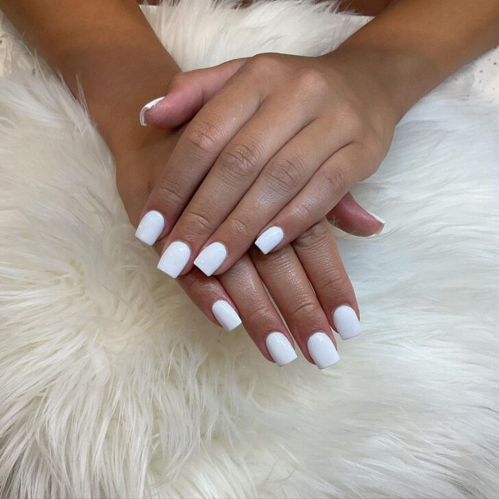 Short white dip powder manicure