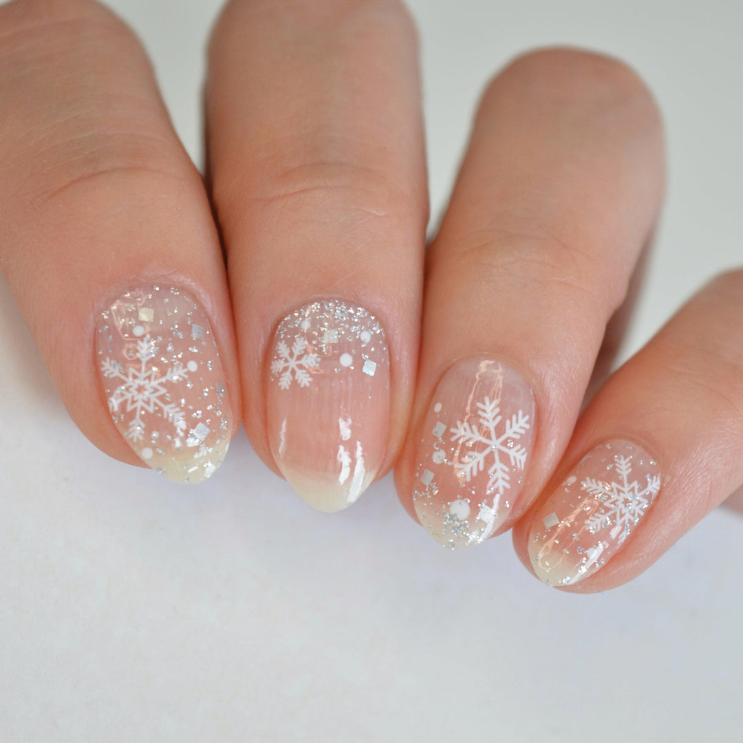 Matte nails with white snowflake decals