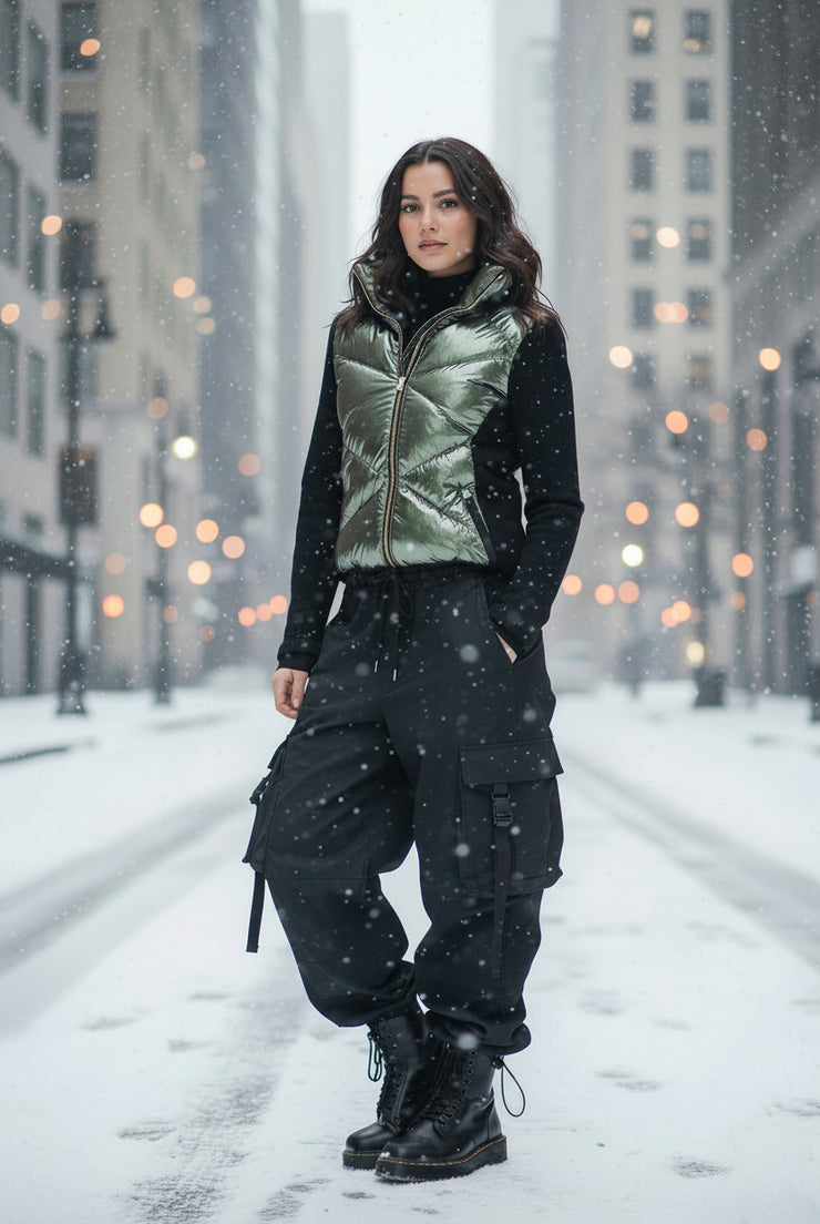 Woman wearing an oversized puffer jacket in a winter street-style outfit